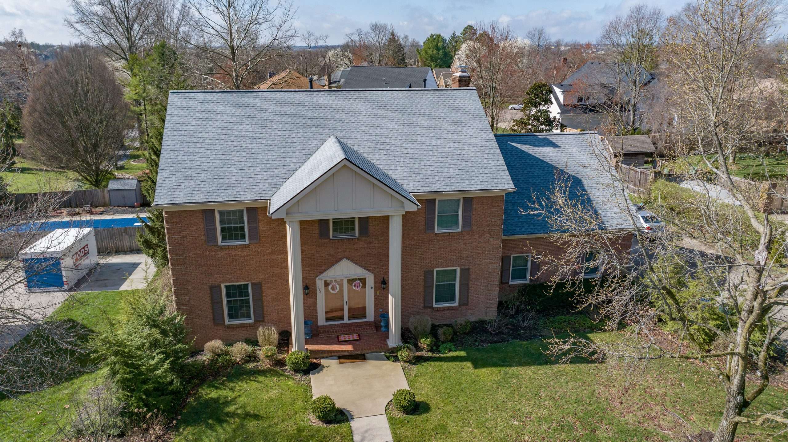Brand new roof with a variegated gray color shingle from GAF called Appalachian Sky. AIC Roofing & Construction is the leading roofing company in Lexington, Louisville, and Cincinnati.