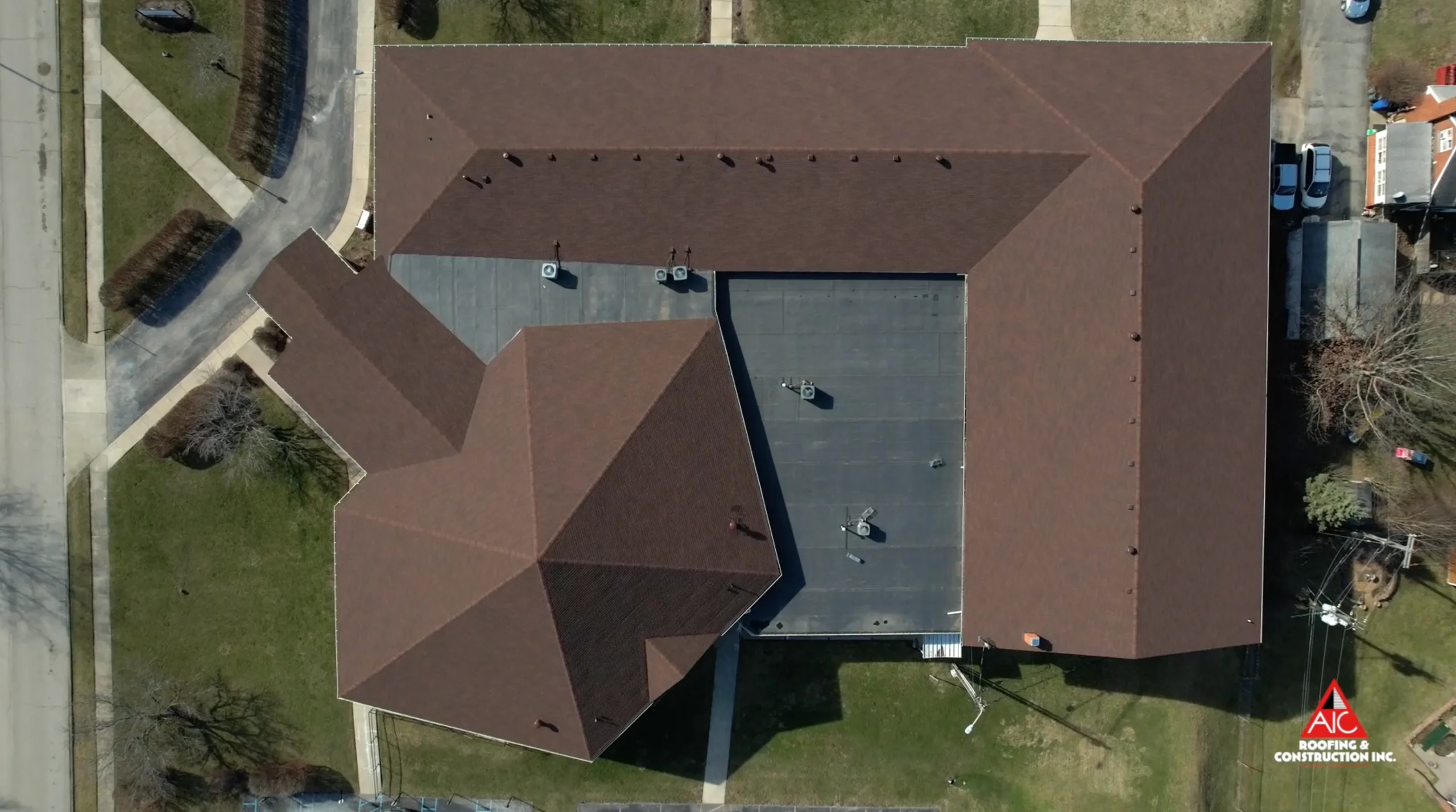 Aerial View of a Church Roof Replacement with High-Quality Shingles