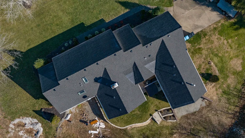 Enhance your home with a new roof – take advantage of our special offers. Aerial view of a completed roof replacement in Crestwood KY with GAF Timberline HDZ shingles installed by a professional roofing contractor.