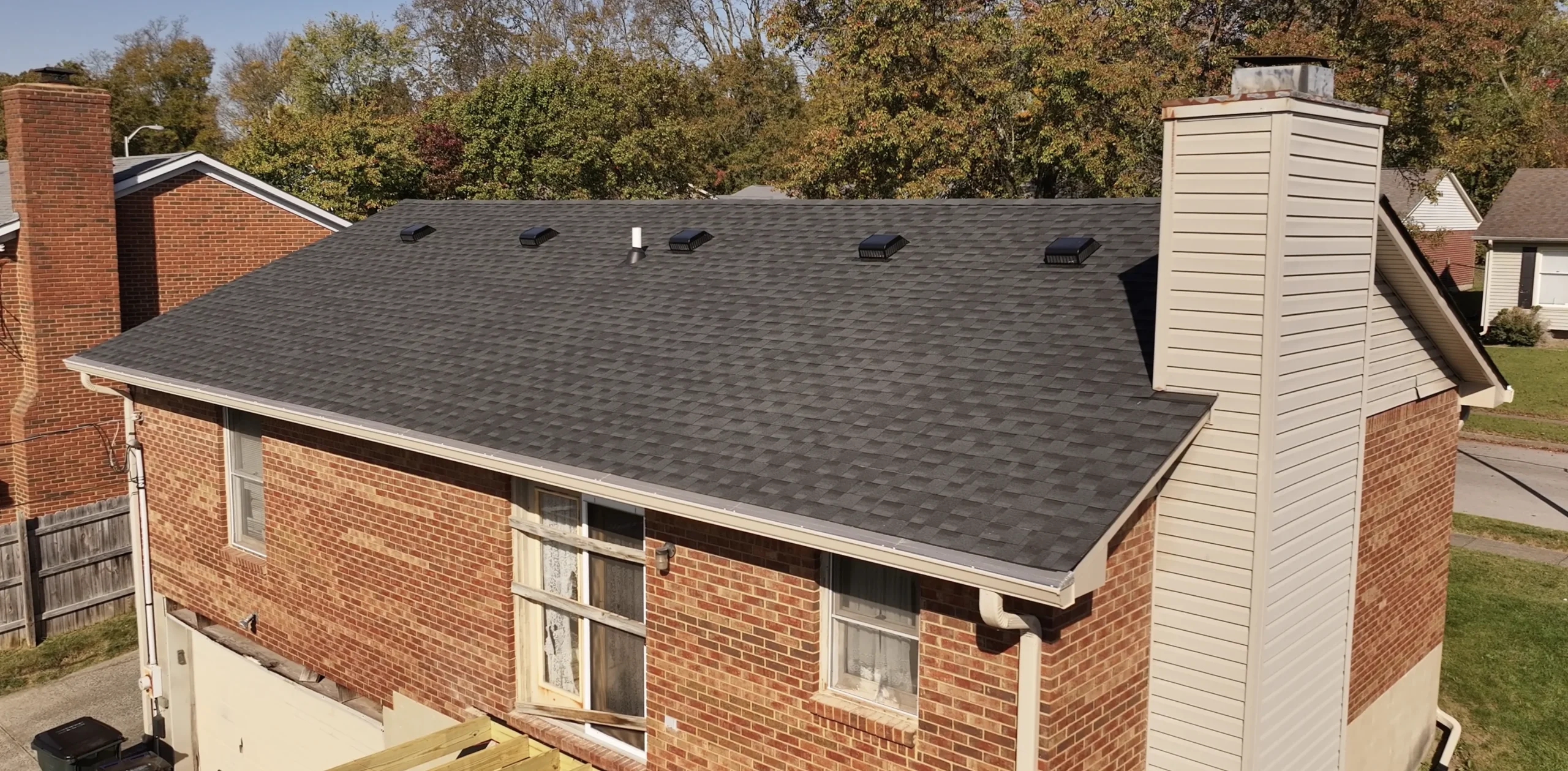Roof replacement featuring GAF Timberline HDZ shingles in Charcoal, installed by a local roofing contractor.