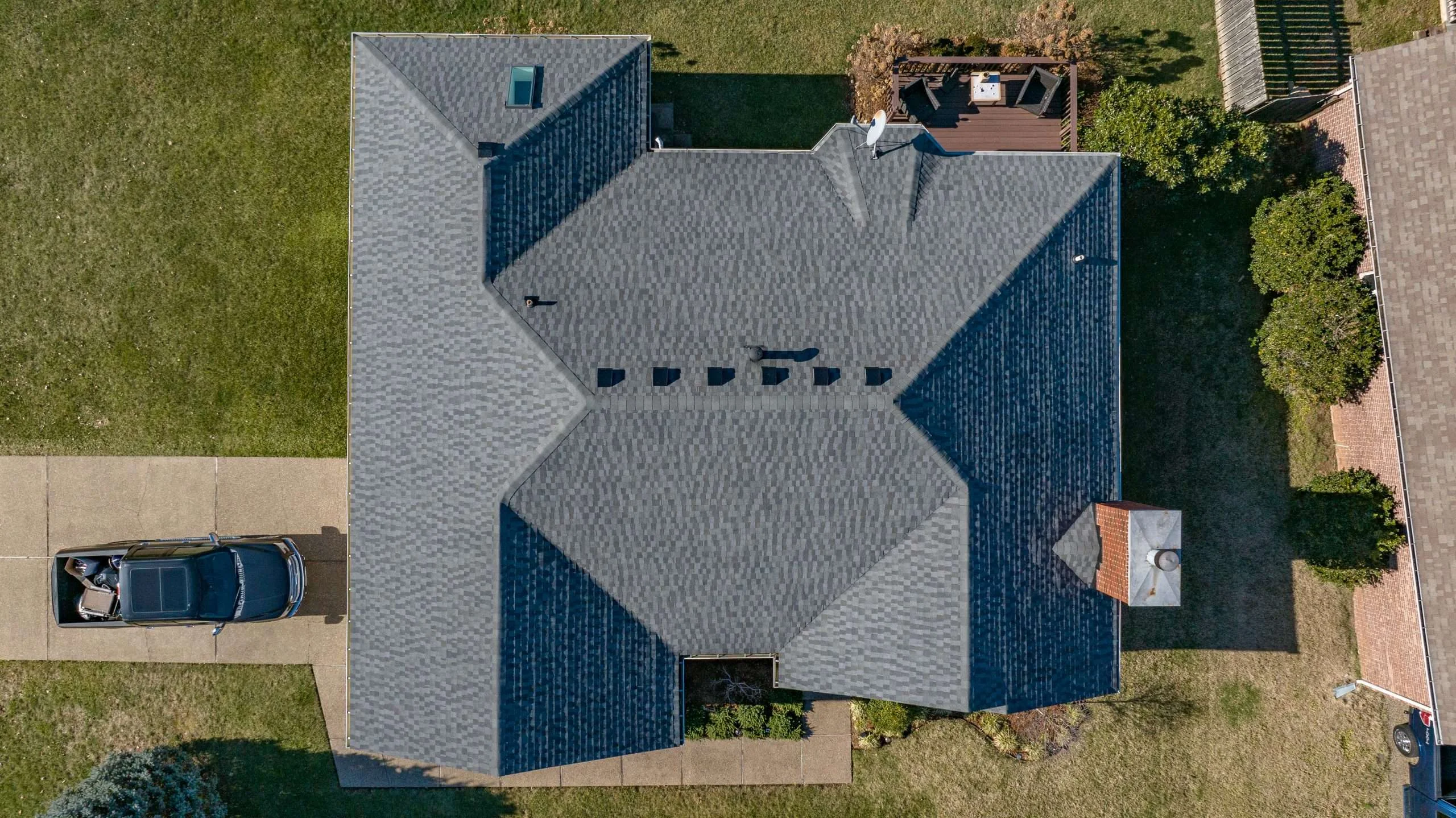 Top-down view of a roof featuring GAF Timberline shingles in Nantucket Morning, professionally installed by a Louisville roofing contractor.