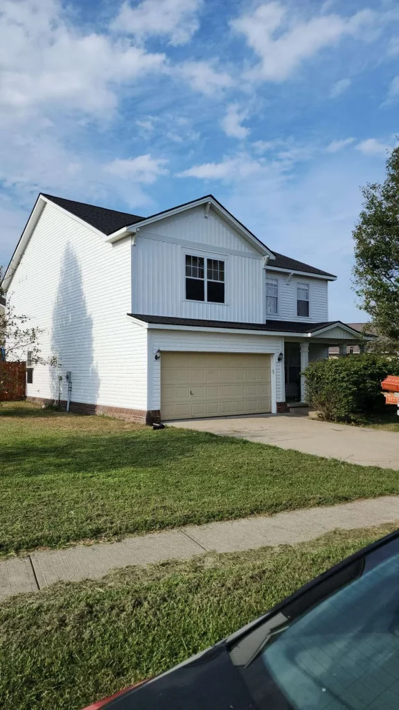 New siding installation on a two-story home in Lexington, KY, showcasing AIC Roofing & Construction’s professional siding services.