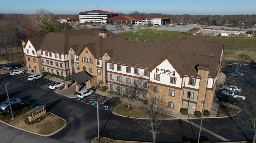 A newly installed shingle roofing system on a multifamily property in Louisville, KY, completed by AIC Roofing & Construction.
