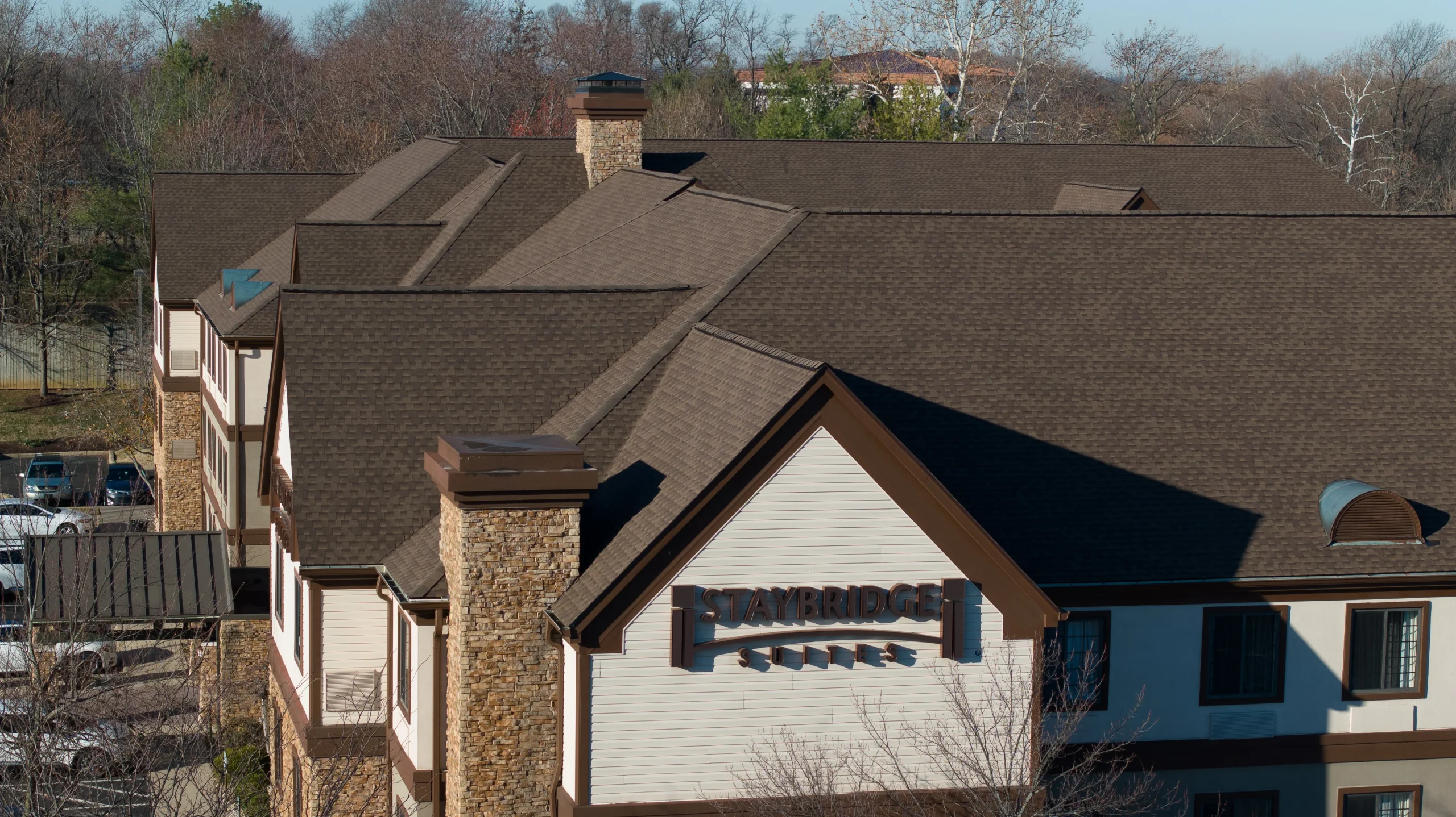 Multifamily roof replacement in Louisville, KY featuring a high-quality shingle roofing system installed by AIC Roofing & Construction.