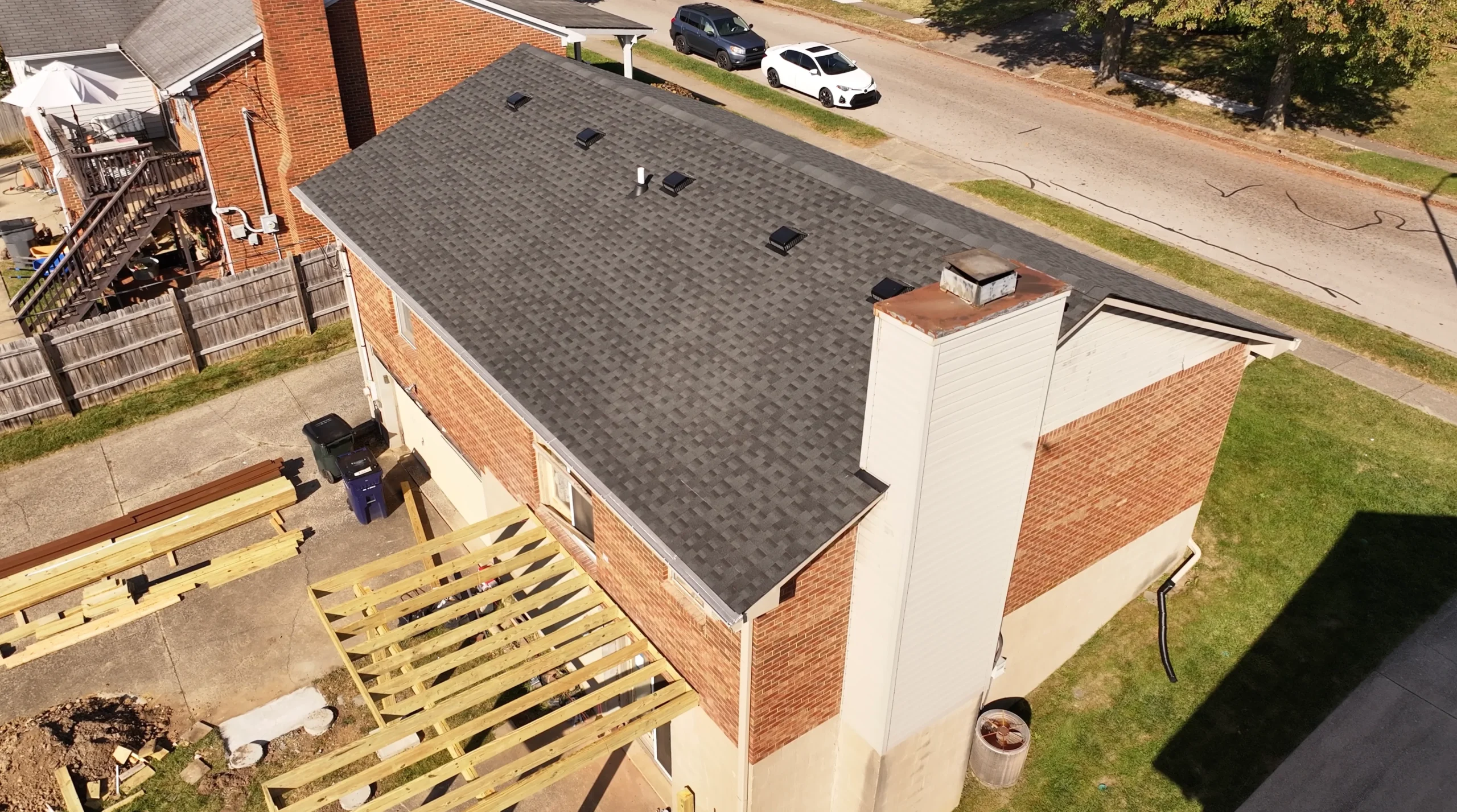 New roof replacement featuring GAF Timberline HDZ shingles in Charcoal, installed by a trusted local roofing contractor