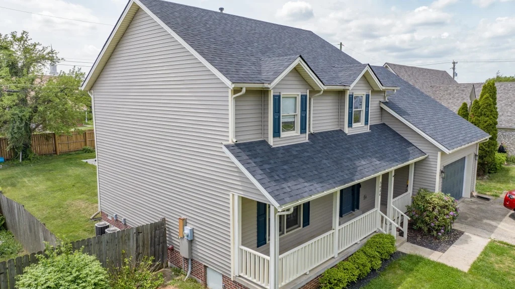 Newly installed siding on a residential home KY, completed by AIC Roofing & Construction, providing high-quality siding and roofing services.