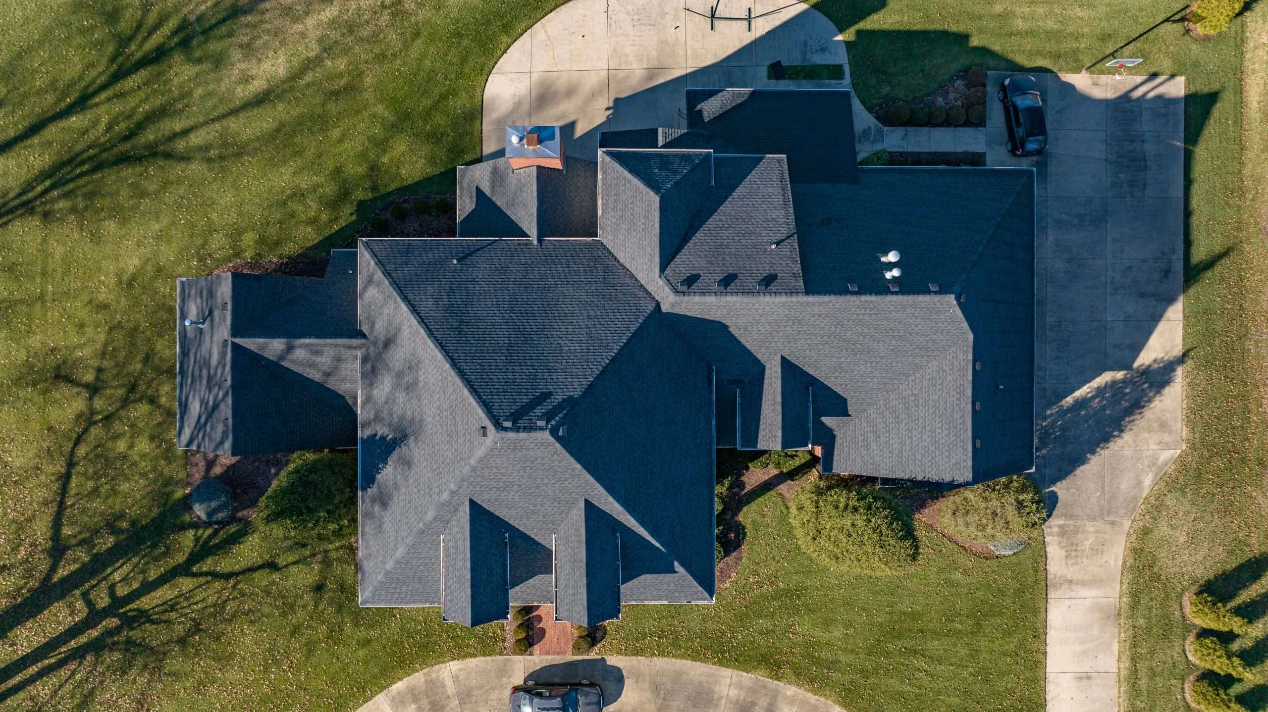 Top-down view of a Prospect KY roof replacement in Charcoal using GAF Timberline HDZ shingles by AIC Roofing & Construction