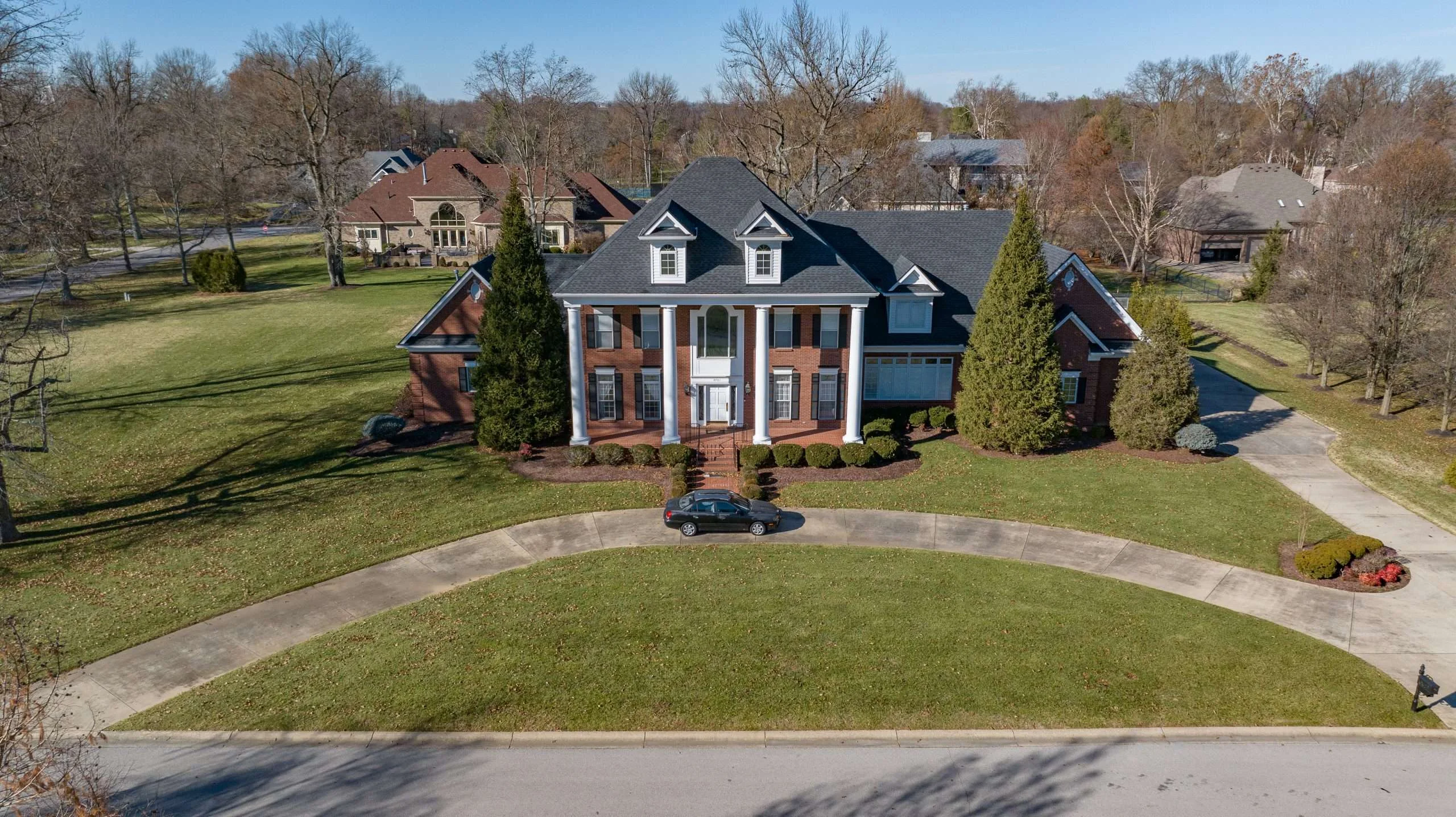 Prospect KY home with new roof replacement in Charcoal, using GAF Timberline HDZ shingles by AIC Roofing & Construction