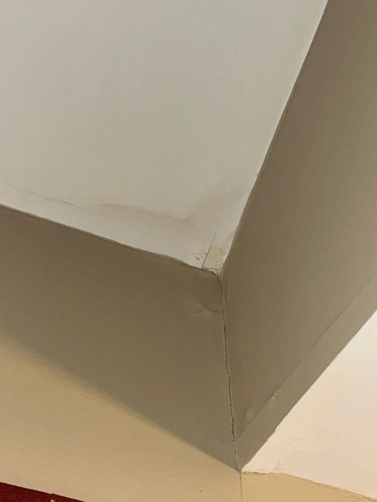 example of roof stain Water stain on the ceiling corner of a commercial building, indicating the need for commercial roof repair in Lexington KY.