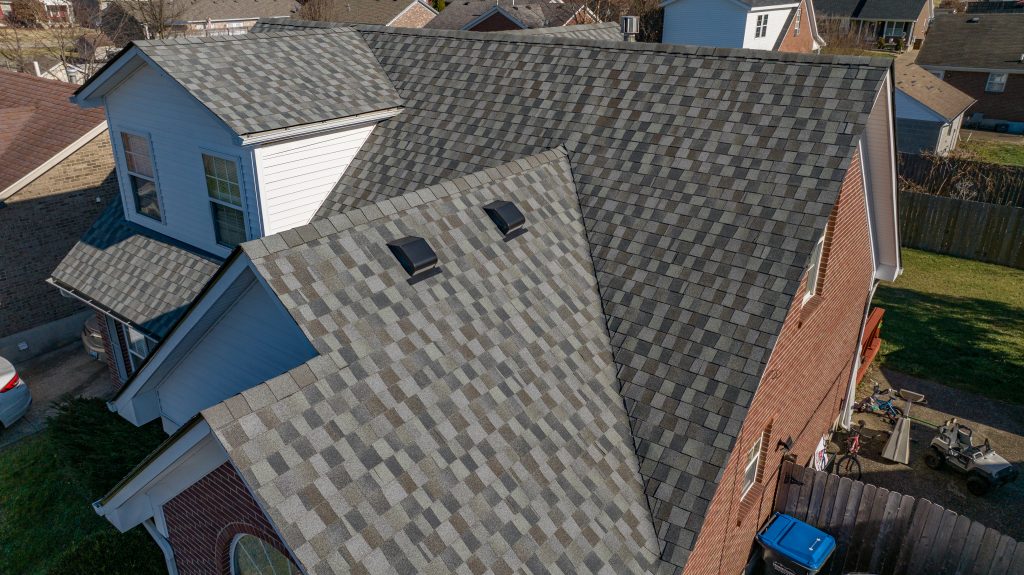 Close-up aerial image showing recent roof repair in Louisville with attention to roof leak areas.