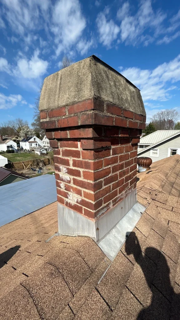 Chimney flashing and shingles showing signs of wear – roof repair needed in Richmond KY