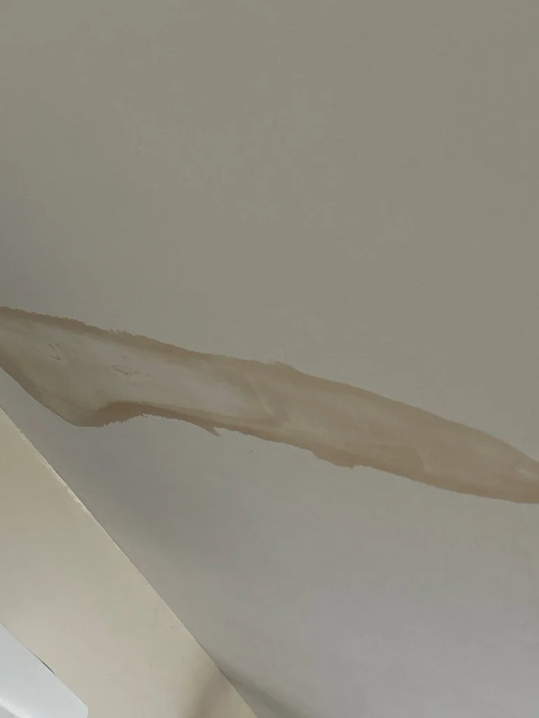 Water-stained ceiling from a leaking commercial roof in Louisville KY.
