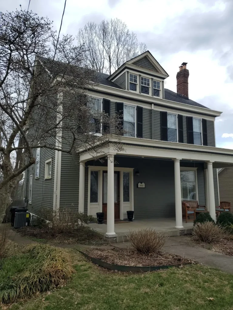 Historic two-story home in Lexington, KY with a newly installed roof by AIC Roofing & Construction.