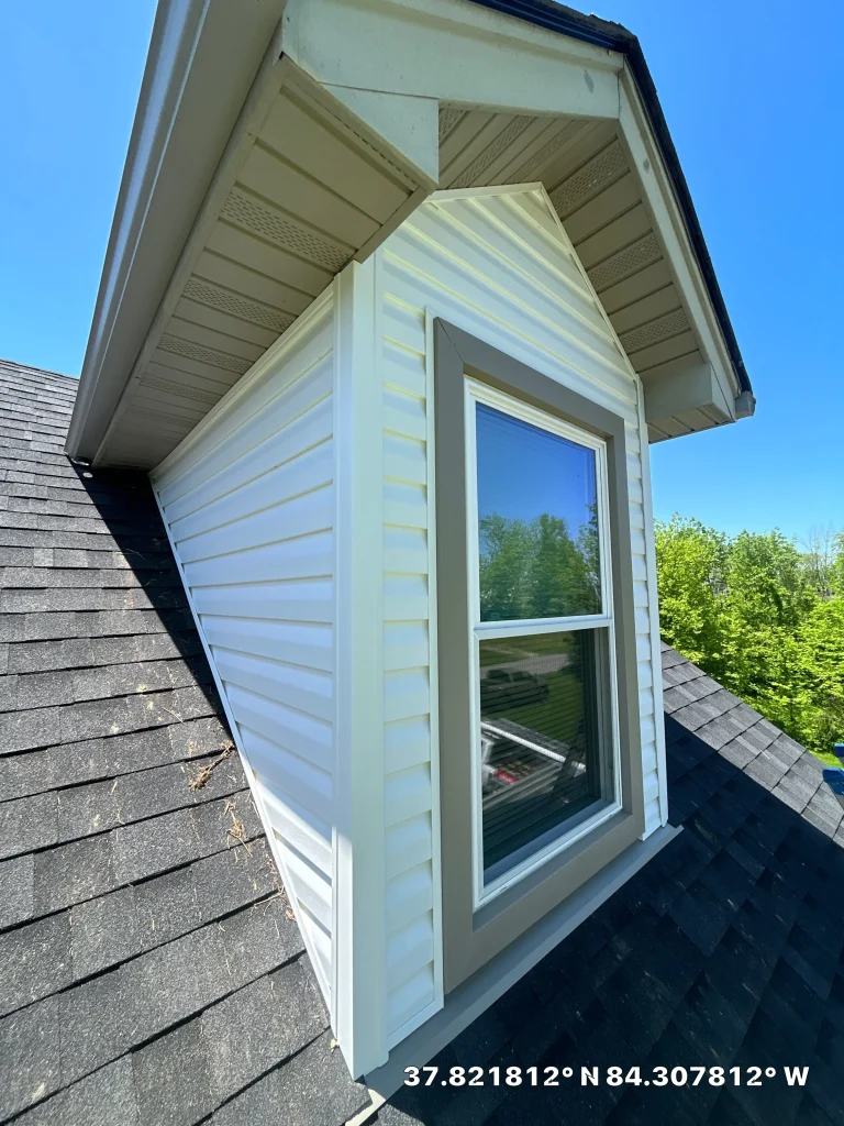 Close-up of newly installed siding and trim on a Richmond home by AIC Roofing & Construction.
