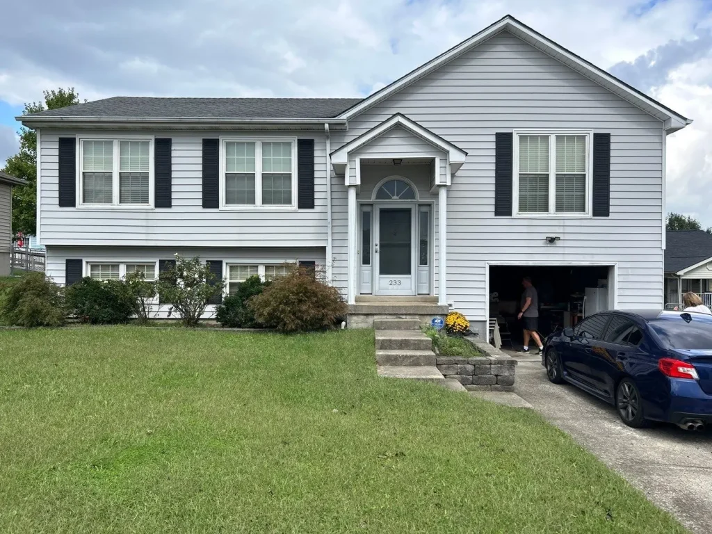 Richmond home with new roof replacement by AIC Roofing & Construction.