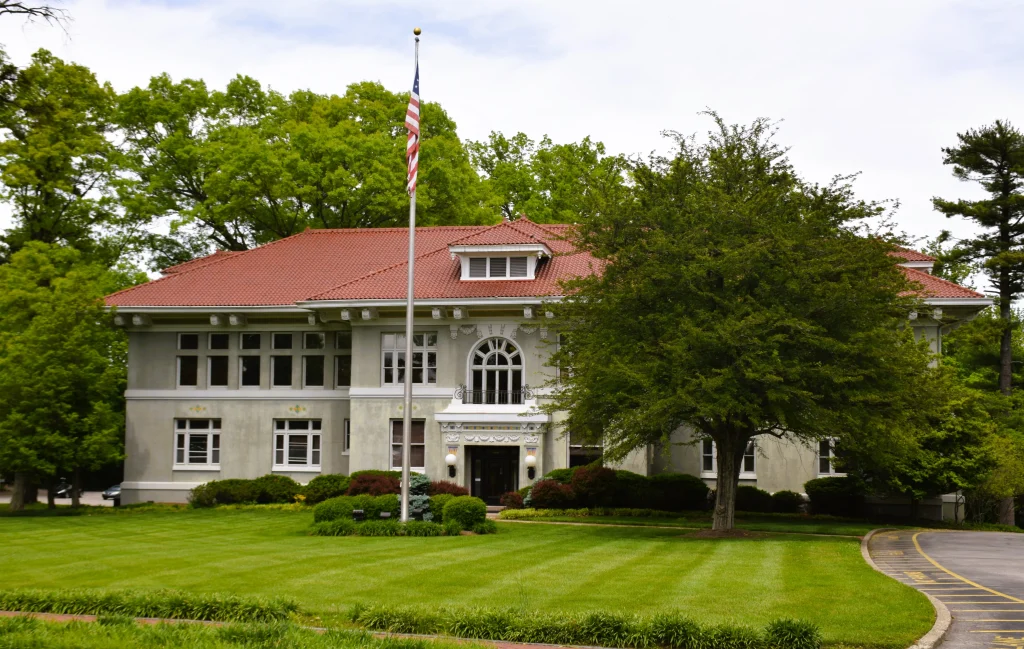 Red tile roof and stately facade of Anchorage, Kentucky’s city building