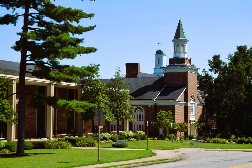 Asbury University campus buildings with traditional roofs maintained by Wilmore roofing contractors
