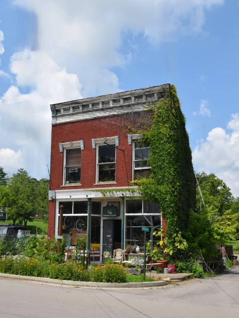 Ivy-covered red brick art gallery building in Paint Lick, KY
