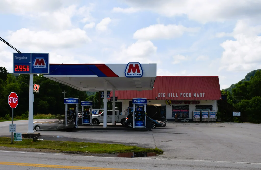 Red-roofed food mart and Marathon gas station in Bighill, Kentucky.