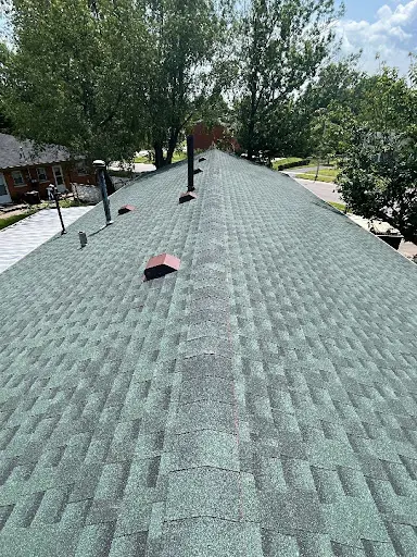 Green shingle roof with ridge and box vents on a residential home in Lexington, KY