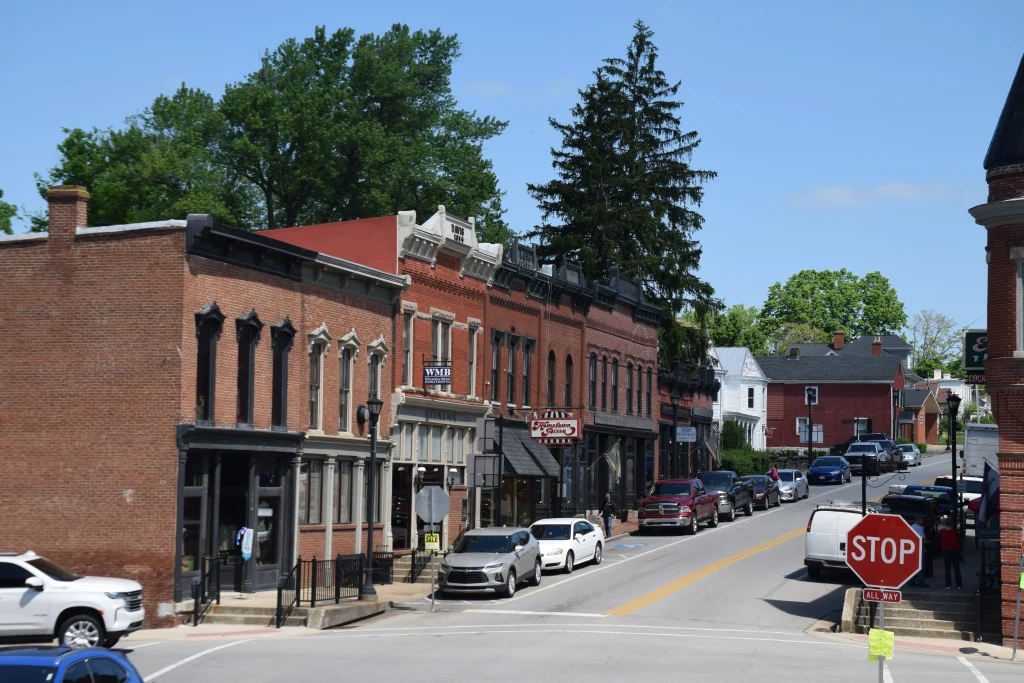 Street view of historic storefronts and businesses along Main Street in Bloomfield KY