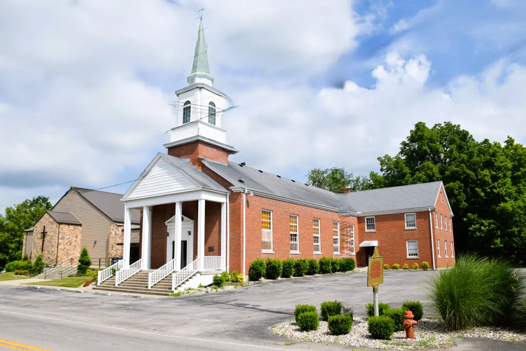 Brick church with white steeple in Crab Orchard, KY