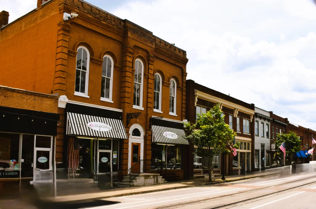 Row of historic brick storefronts in downtown La Grange, Kentucky