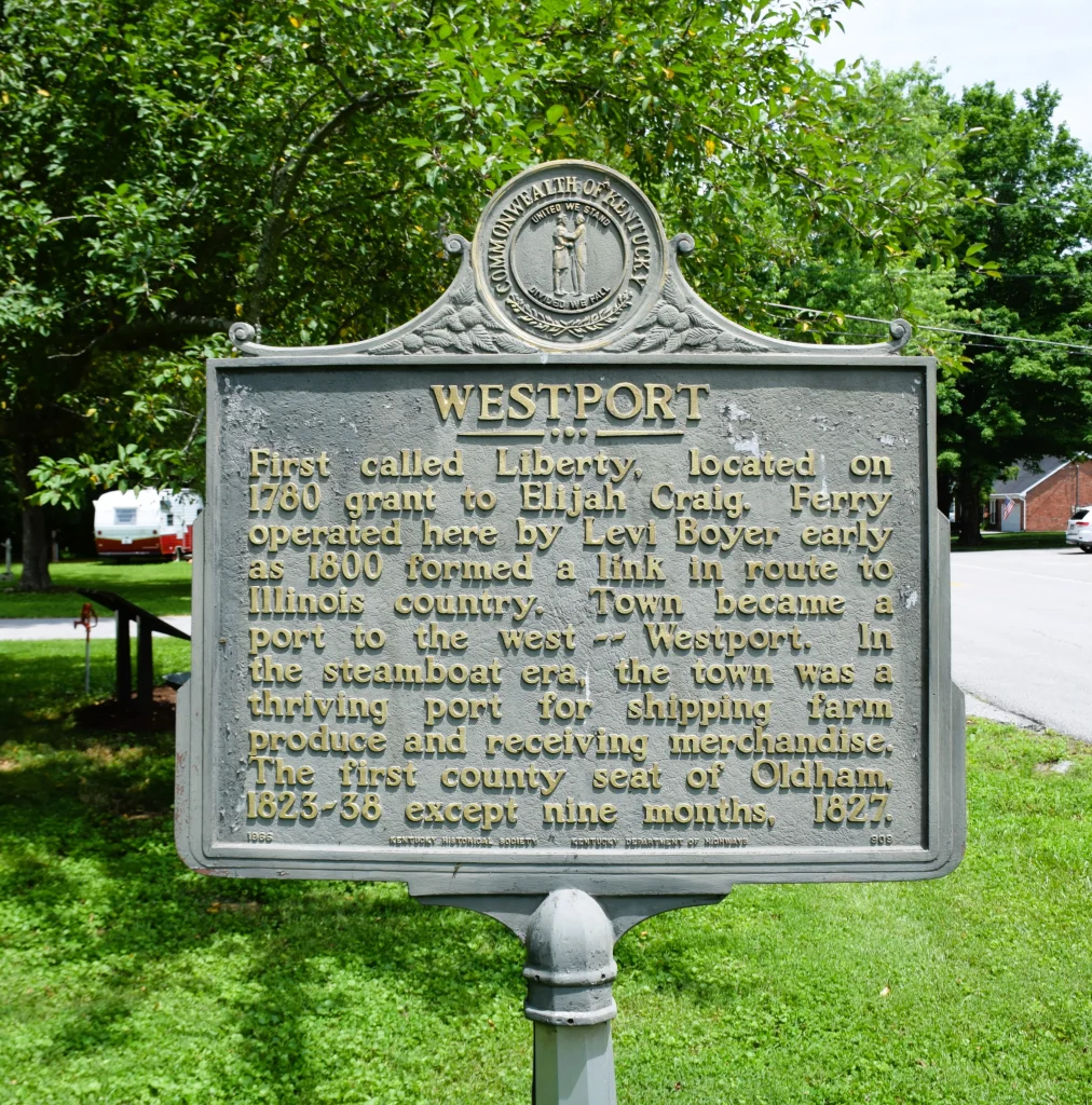 Westport Kentucky historical sign surrounded by homes with updated roofing
