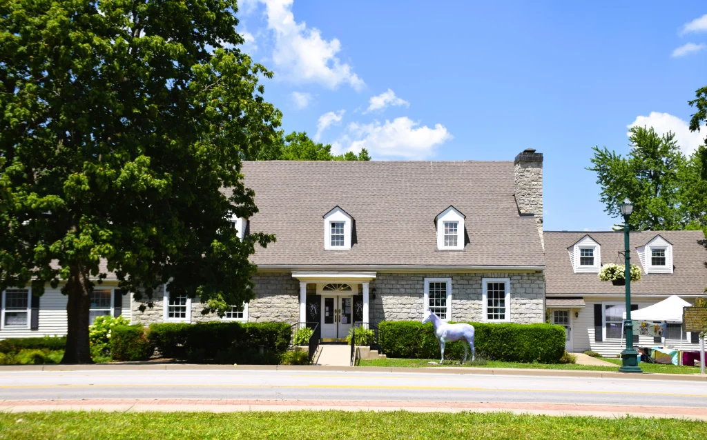 Simpsonville home with asphalt shingle roof maintained by local Simpsonville roofing contractors