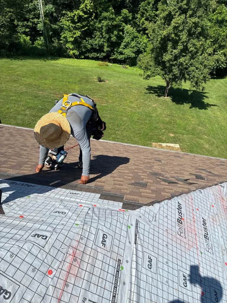 Roof repair underway in Richmond, KY by AIC Roofing & Construction using GAF FeltBuster underlayment