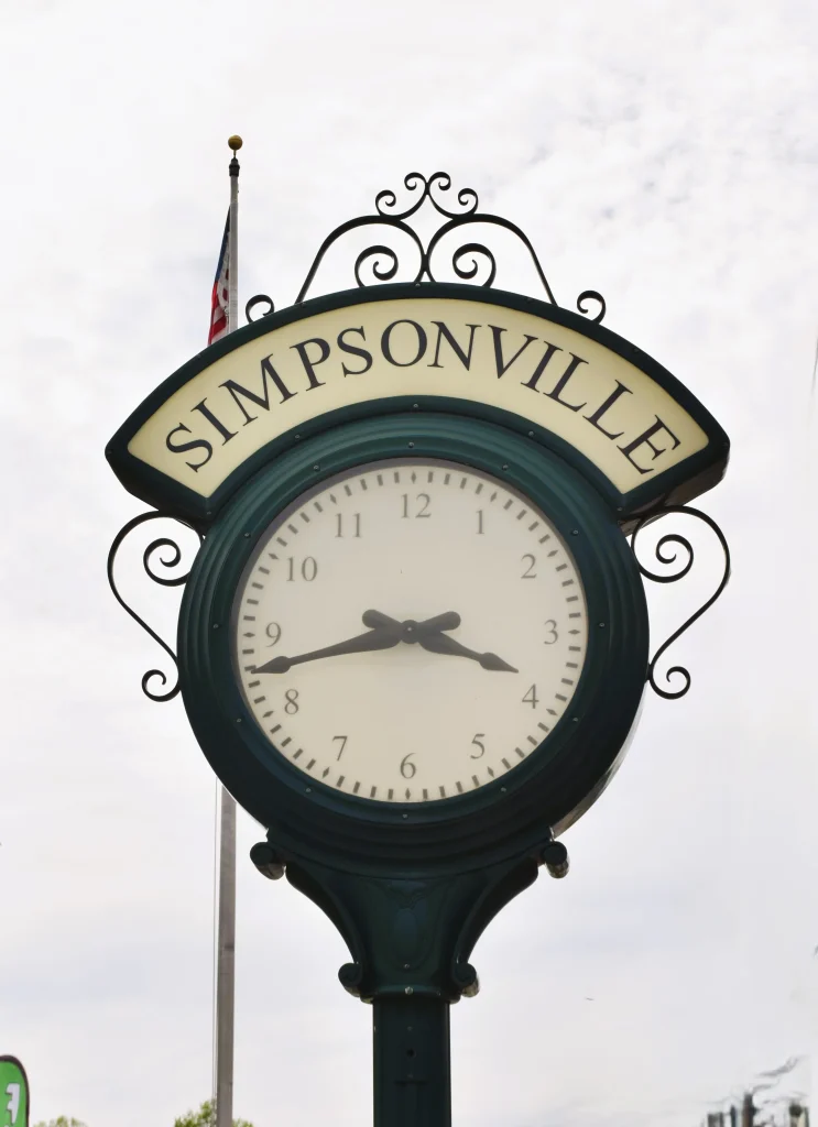 Simpsonville KY downtown clock tower representing the heart of the Simpsonville roofing service area