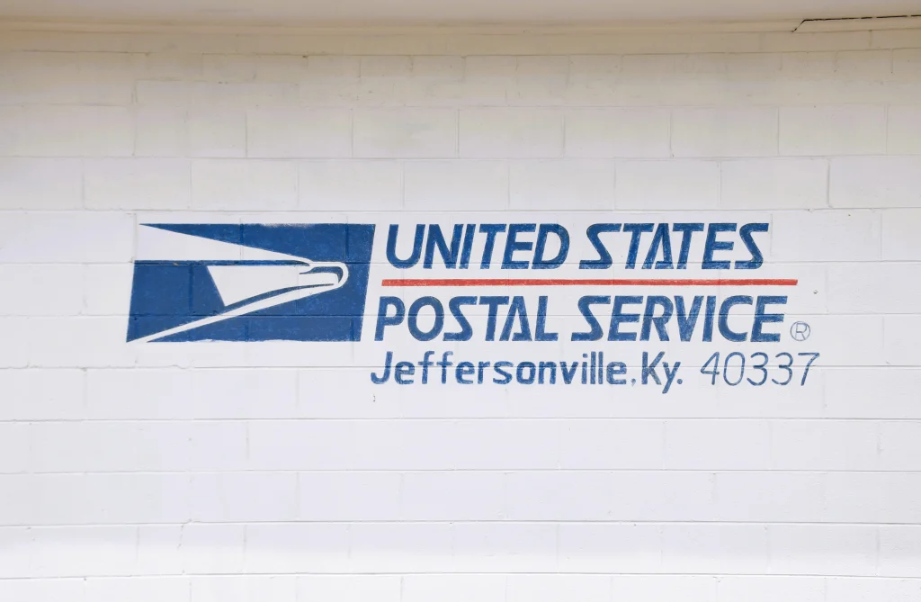 United States Postal Service mural on a brick wall in Jeffersonville, KY