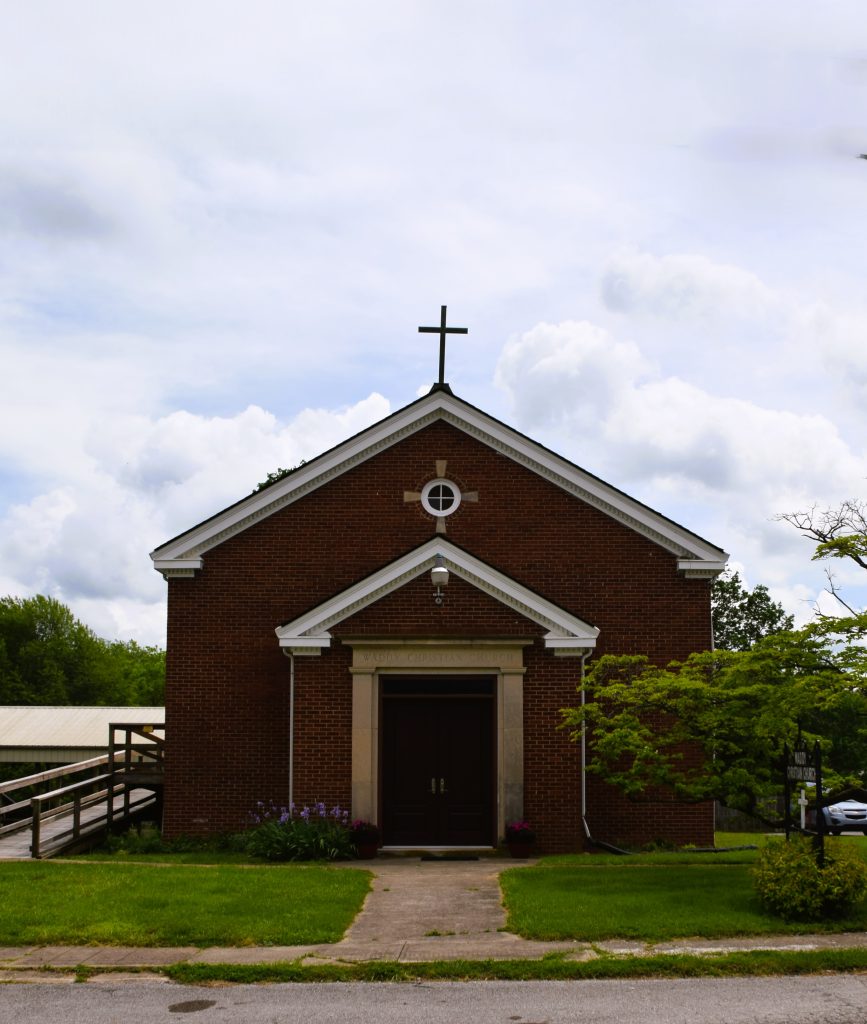 Brick church in Waddy, Kentucky with asphalt shingle roofing