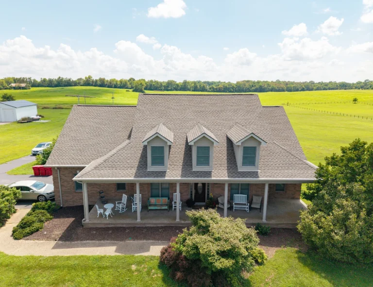 New GAF UHDZ shingle roof replacement on a large country home with dormer windows.