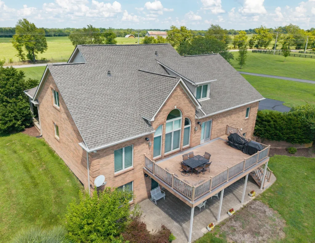 AIC Roofing & Construction completed a roof replacement using premium GAF UHDZ shingles on a two-story brick home.