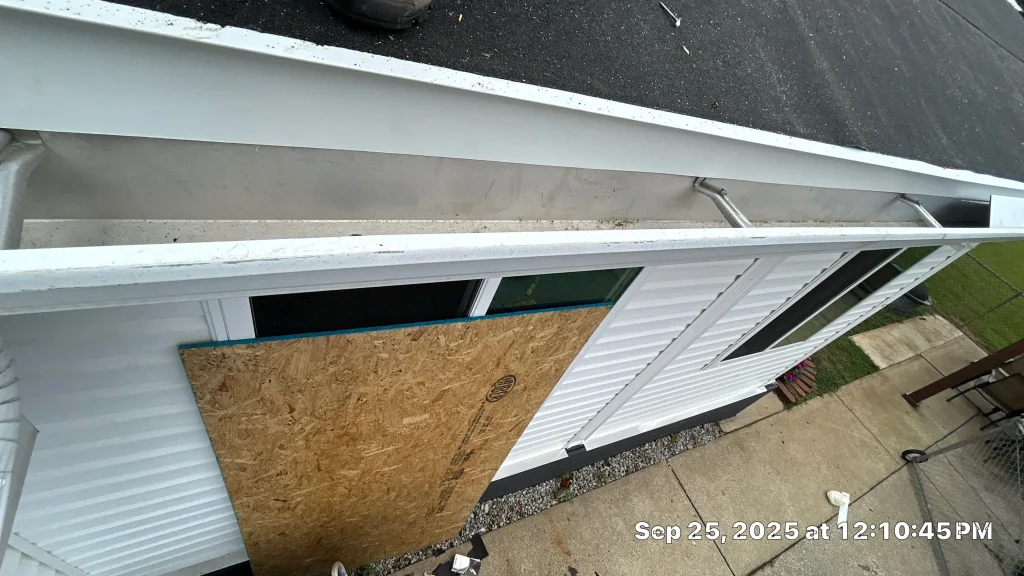 Residential gutters on a Louisville home before gutter guard installation, showing clean but unprotected channels.