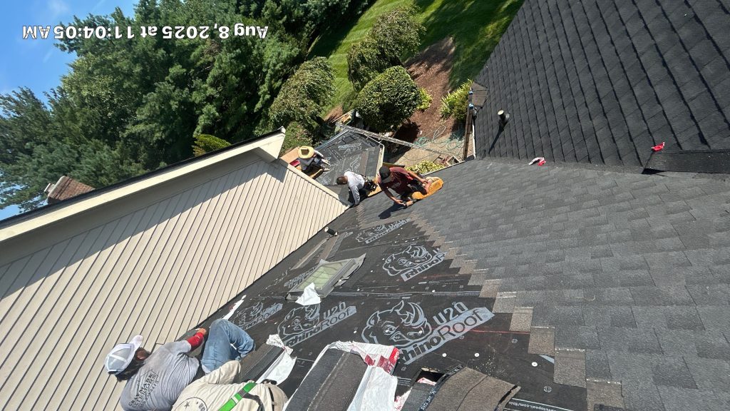 Shingle Repair in Progress on Louisville Roof Roofing crew installing new shingles and underlayment on a residential roof in Bardstown, Kentucky.