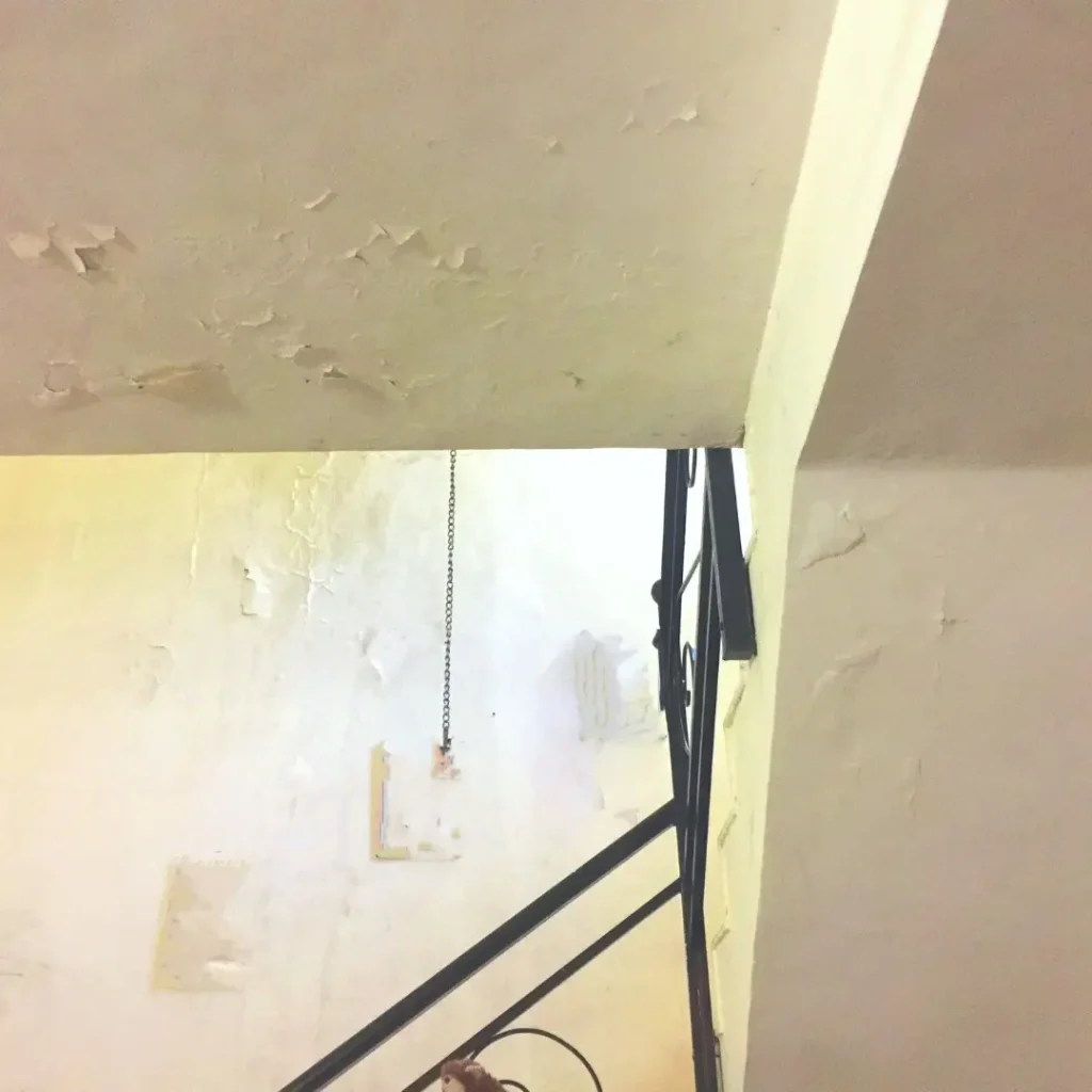 Interior wall and ceiling damage from a leaky roof inside a Shepherdsville, KY home.