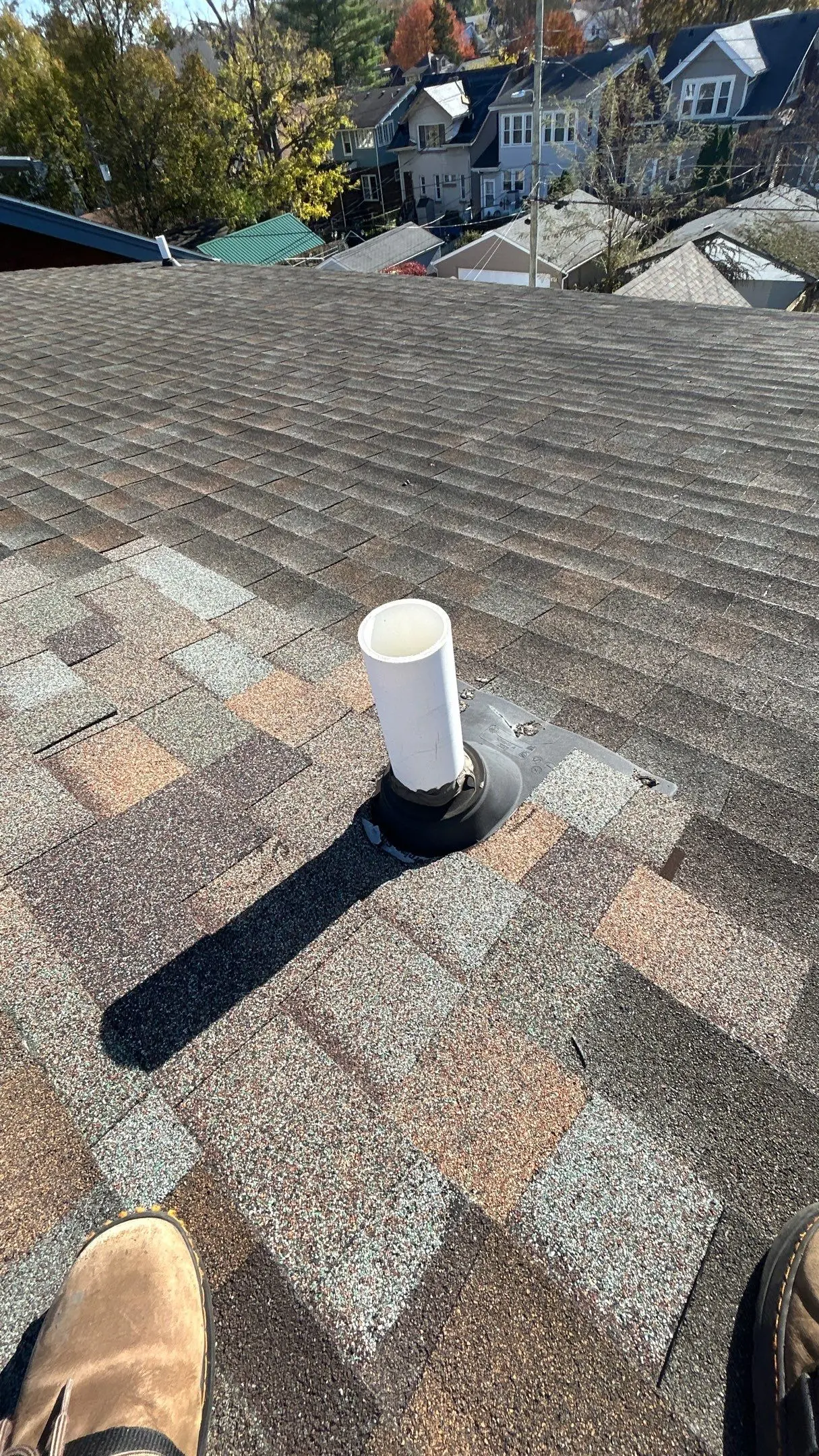 Roof vent pipe with a worn vent boot on an asphalt shingle roof during an inspection on a Louisville KY home.
