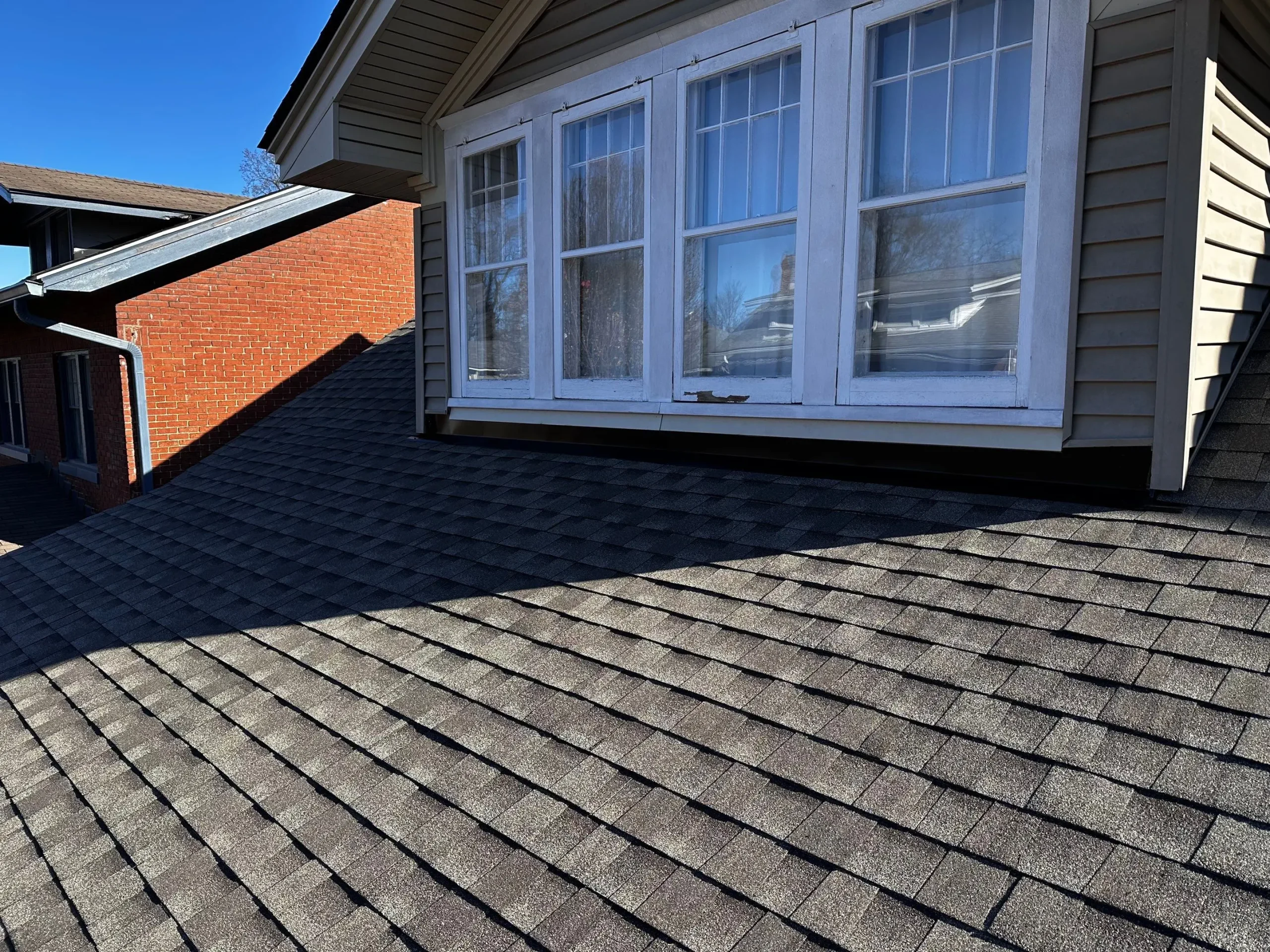 Damaged roof dormer on a residential home in Louisville, Kentucky needing repairs