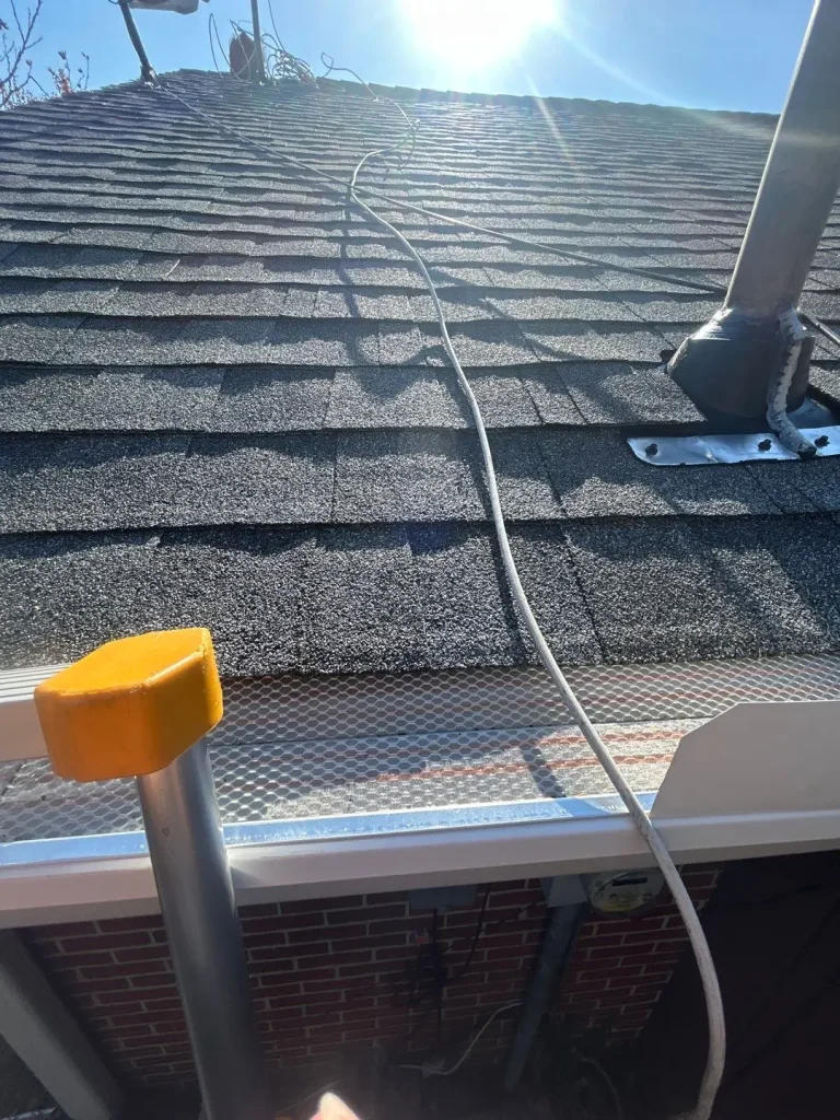 Newly installed gutter guards on a Louisville, Kentucky home protecting gutters from debris