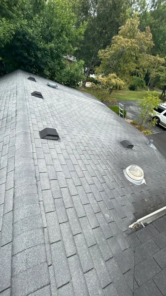 Properly sealed roof penetrations on a newly installed asphalt shingle roof in Taylorsville, Kentucky