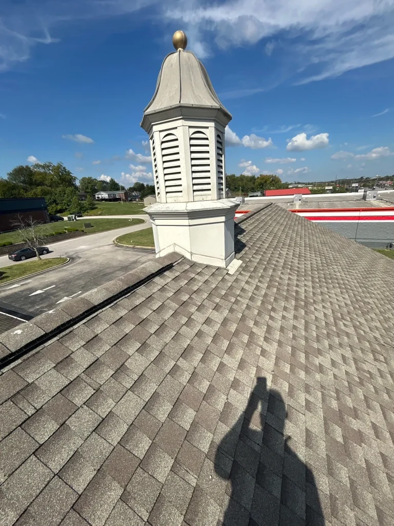 Properly installed roof flashing around a cupola on an asphalt shingle roof in Taylorsville, Kentucky
