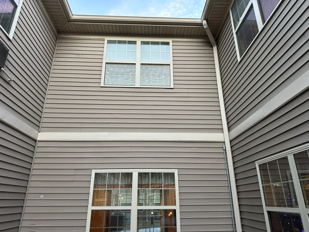 Residential building in Louisville, Kentucky showing siding areas that need replacement or repair
