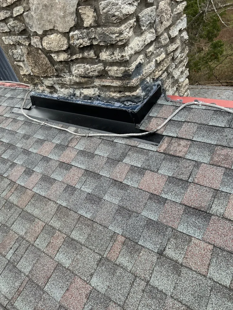 New chimney flashing installed to prevent roof leaks on a Nicholasville KY home
