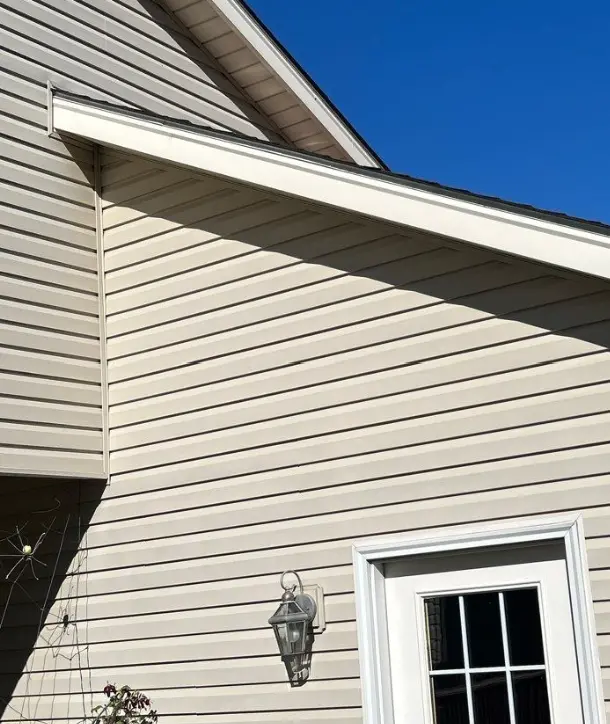 Newly installed vinyl siding on a Taylorsville KY home with clean horizontal panels and updated exterior finish