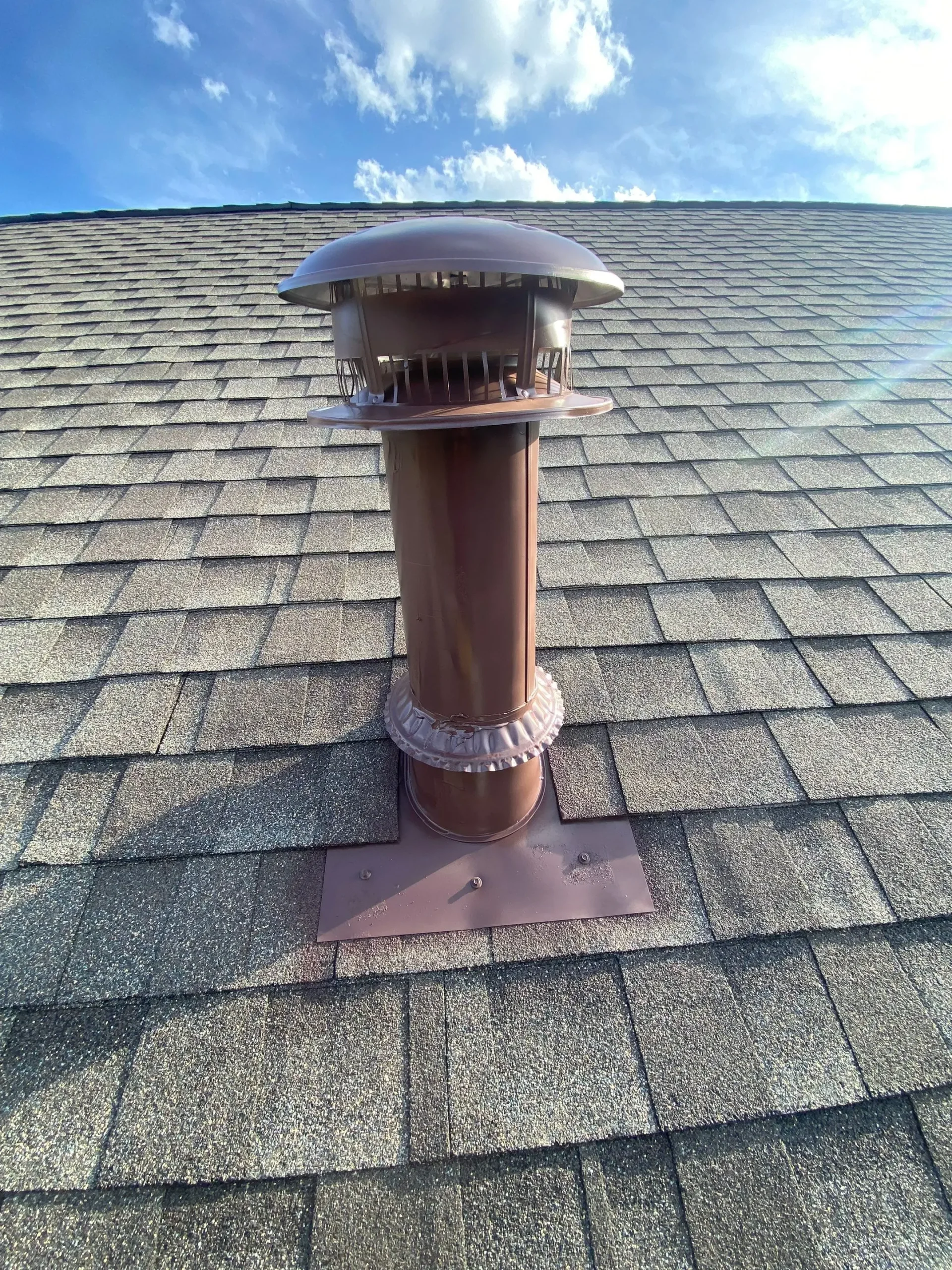 Roof penetration with proper flashing on a new roof in Louisville, KY