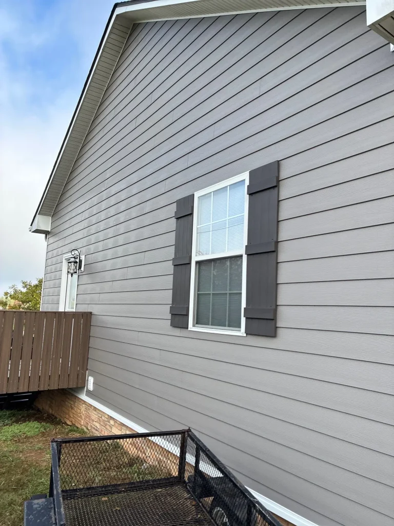 Newly installed gray siding on a home in Nicholasville, KY