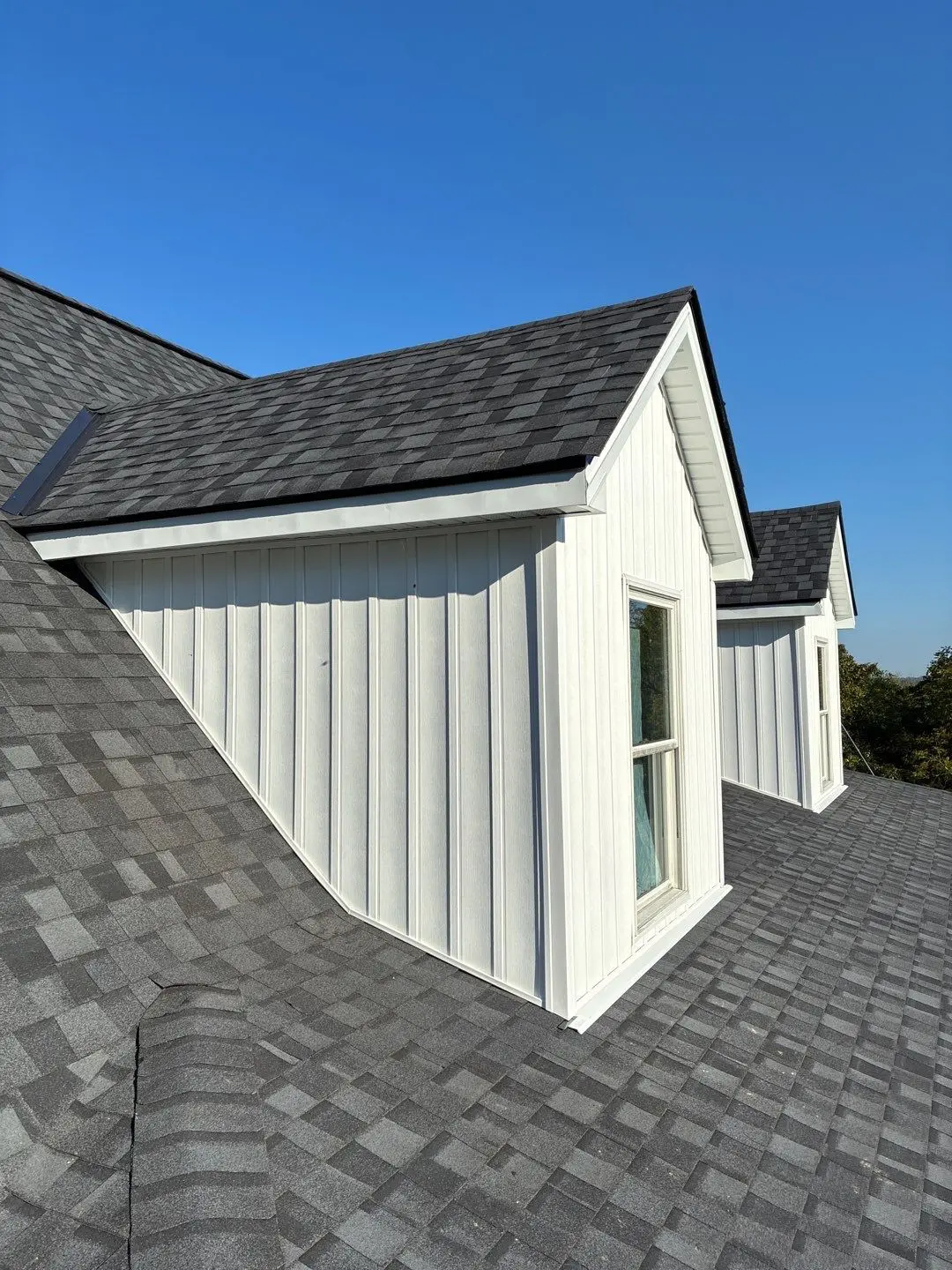 Newly installed roof dormer on asphalt shingle residential home in Lexington Kentucky