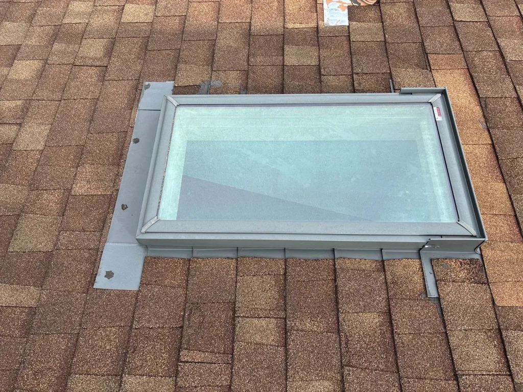 Roof skylight with damaged flashing on a residential home in Lexington Kentucky